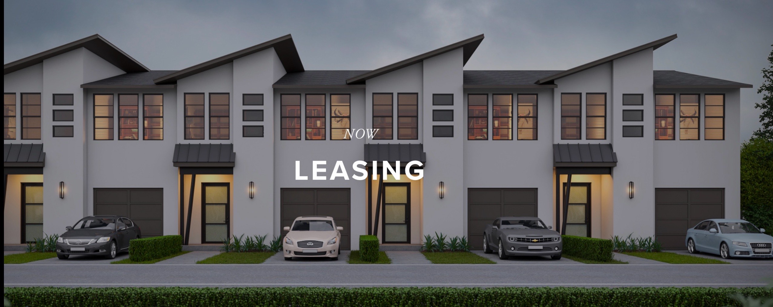 a two cars parked in front of a house